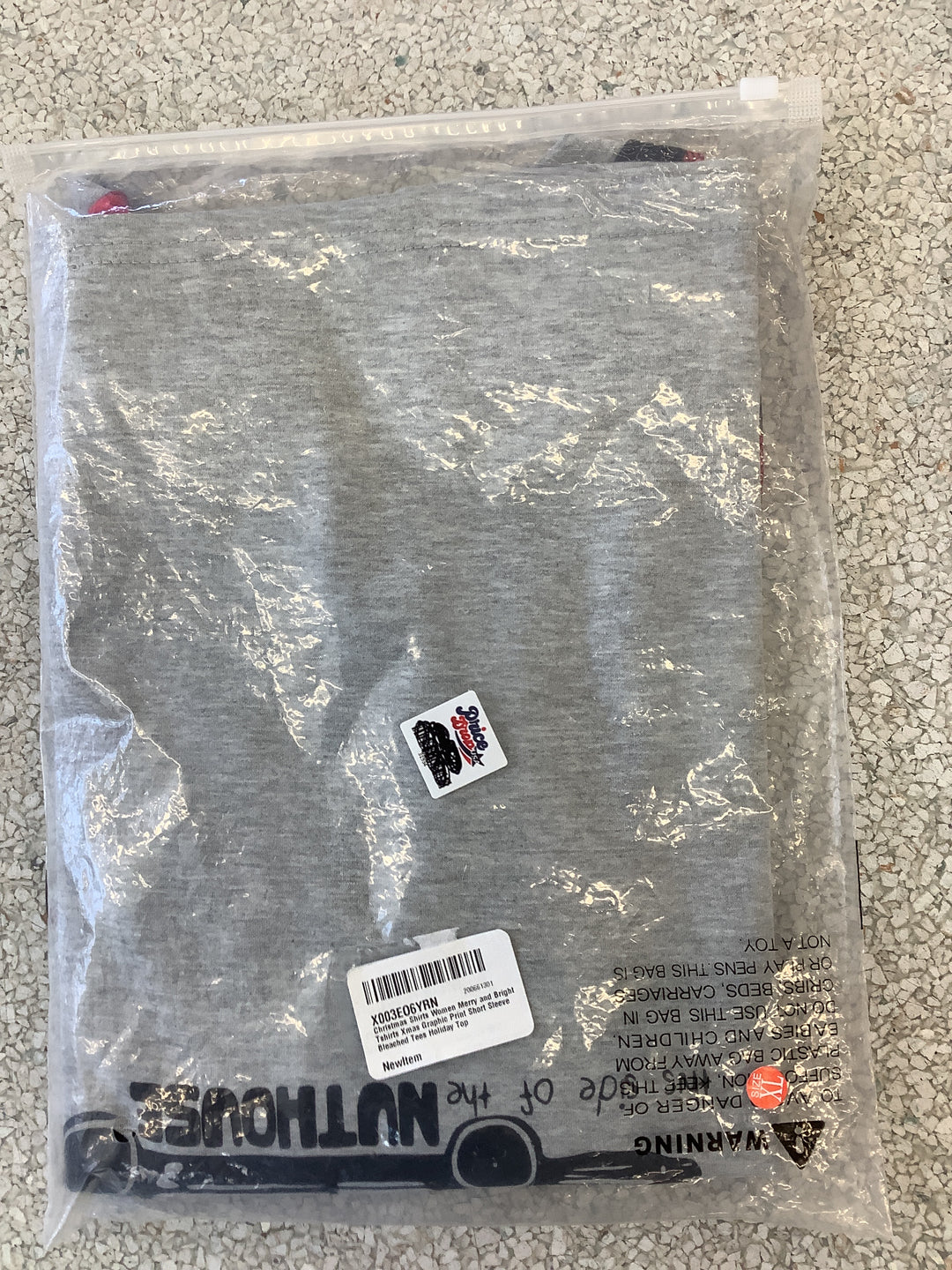 Women's "Welcome to the Nuthouse" Christmas Bleached Graphic T-Shirt in size Extra Large (XL)