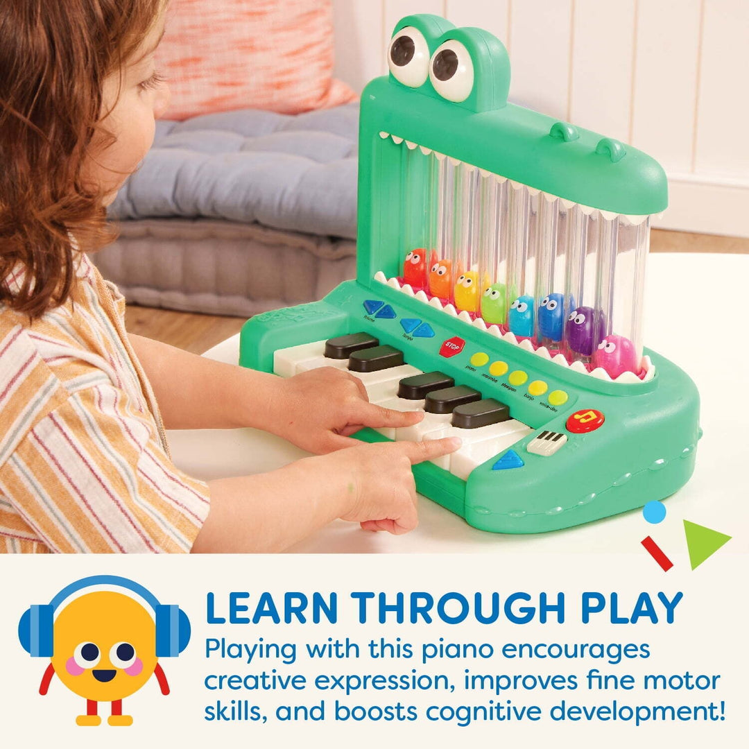 Battat Croco Pop Piano Toy Keyboard with Songs Sounds Lights  Baby and Toddler Toys Retail $34.97