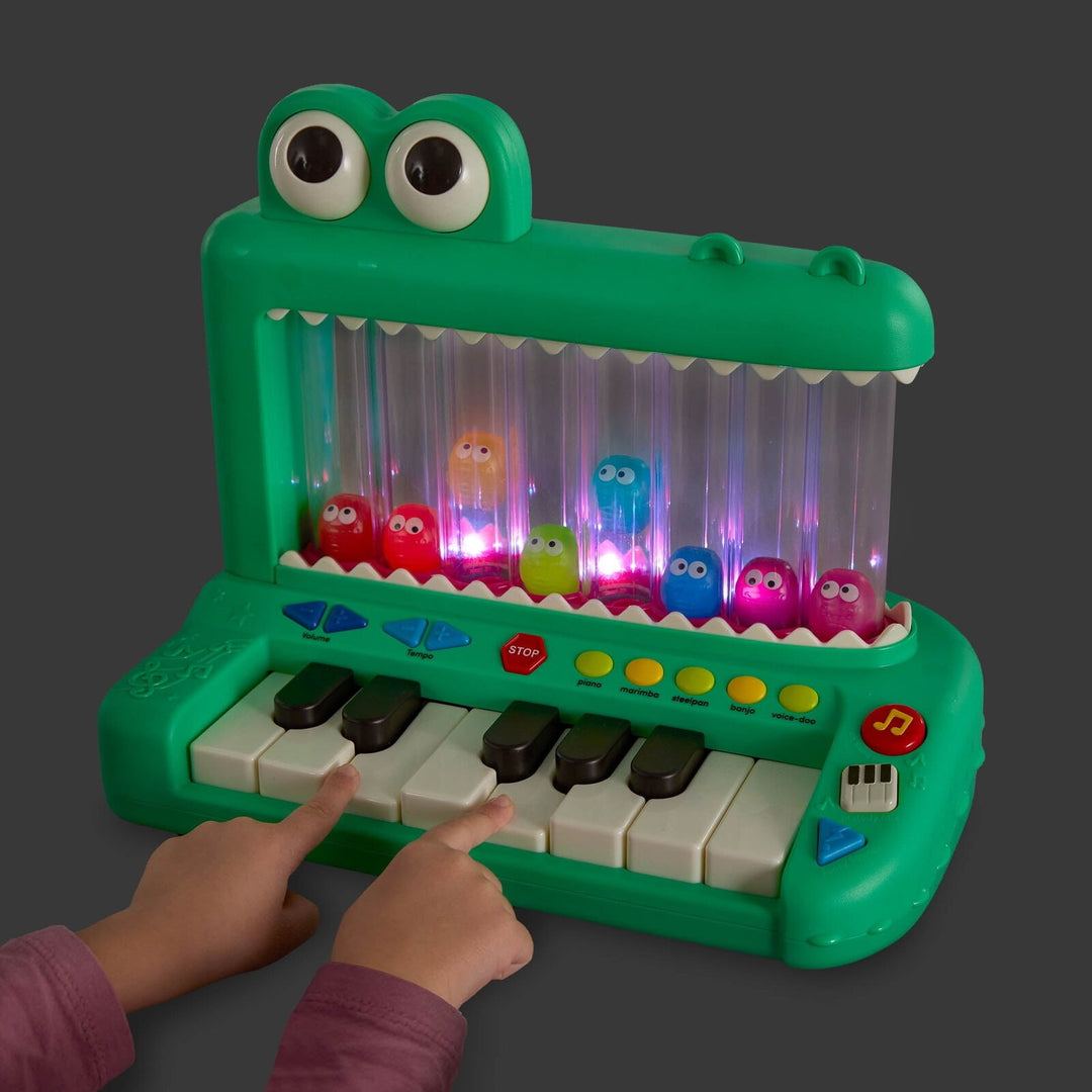 Battat Croco Pop Piano Toy Keyboard with Songs Sounds Lights  Baby and Toddler Toys Retail $34.97