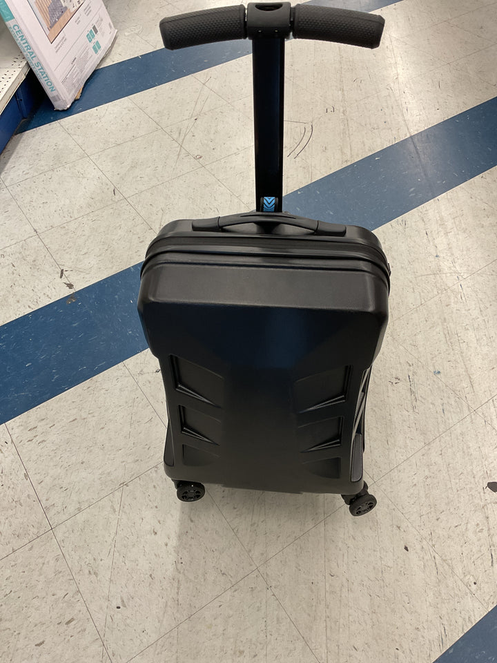 Hard shell ride_ on suitcase