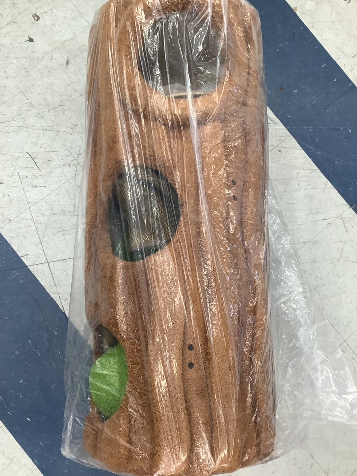 fairy-forest style tree trunk cat tower condo. It features a realistic faux-bark texture wrapped around a multi-level activity cylinder with cubbyholes, steps, and green mossy plush perches designed to bring an enchanted nature theme into your home.