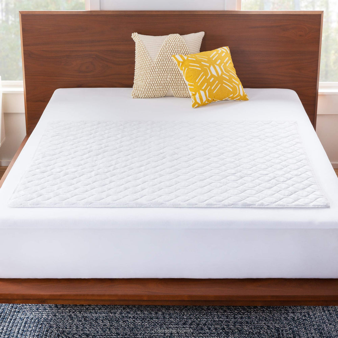 Linenspa Waterproof Mattress Pad â€“ 44" x 52" Non Slip Waterproof Sheet and Mattress Protector â€“ Highly Absorbent, Machine Washable, Quilted â€“ Fits Full & Queen, White