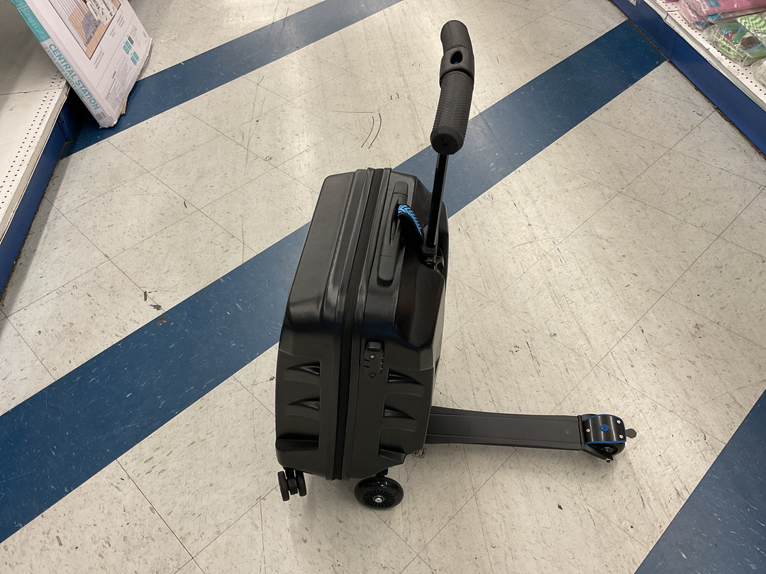 Hard shell ride_ on suitcase