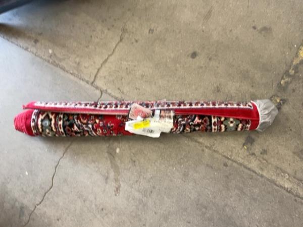 Red Patterned Rolled Area Rug Retail $21.24