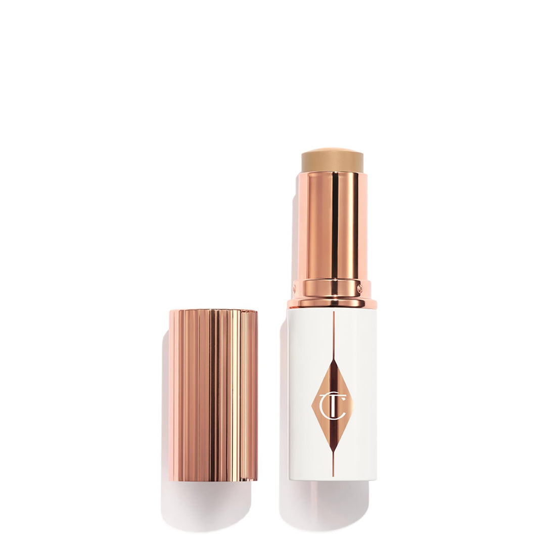 Charlotte Tilbury Unreal Skin Tint & Sheer Glow Hydrating Foundation Stick - Cream Foundation Makeup with Sheer-to-Light Coverage & a Buildable Formula - Blurring, Smoothing & Nourishing - 5 Medium