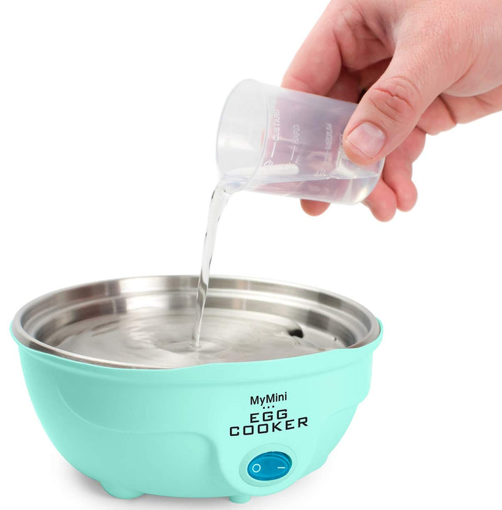 Nostalgia MyMini 7 Egg Cooker makes 7 soft medium or hard boiled eggs egg bowls includes egg white separator (Teal) Retail $12.97