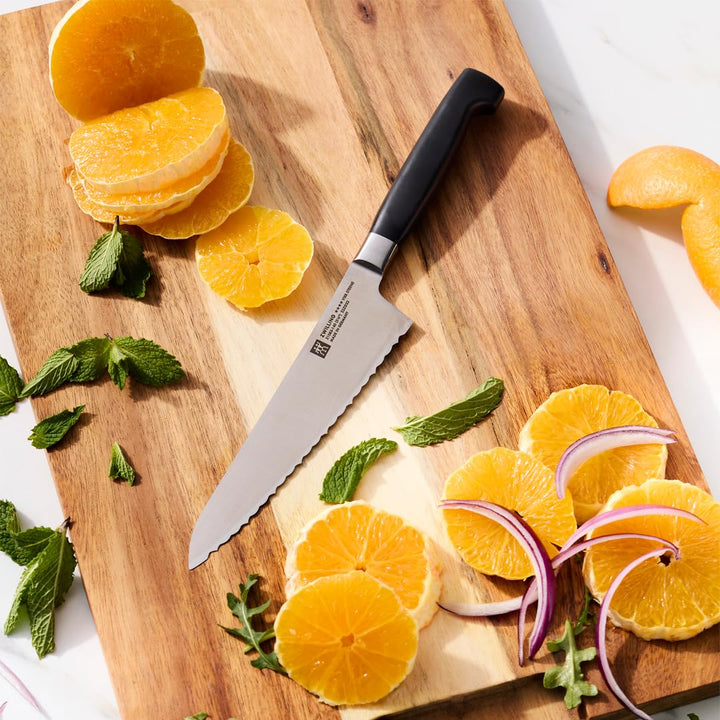 ZWILLING Four Star 5.5-inch Serrated Prep Knife