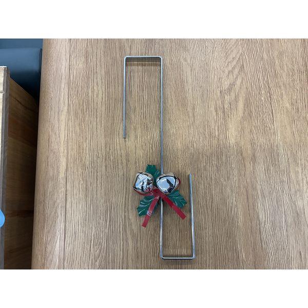 Metal Door Hanger with Jingle Bells, Holly Leaves, and Red Bow Retail $15.00