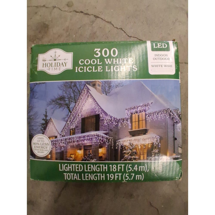 Holiday Time 300 Cool White Icicle Lights - LED, Indoor/Outdoor, White Wire Retail $25.00