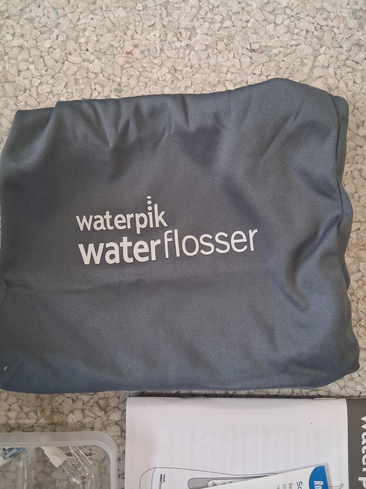 Waterpik Cordless Advanced 2.0 Water Flosser For Teeth, Gums, Braces, Dental Care With Travel Bag and 4 Tips, ADA Accepted, Rechargeable, Portable, and Waterproof, Blue WP-583, Packaging May Vary